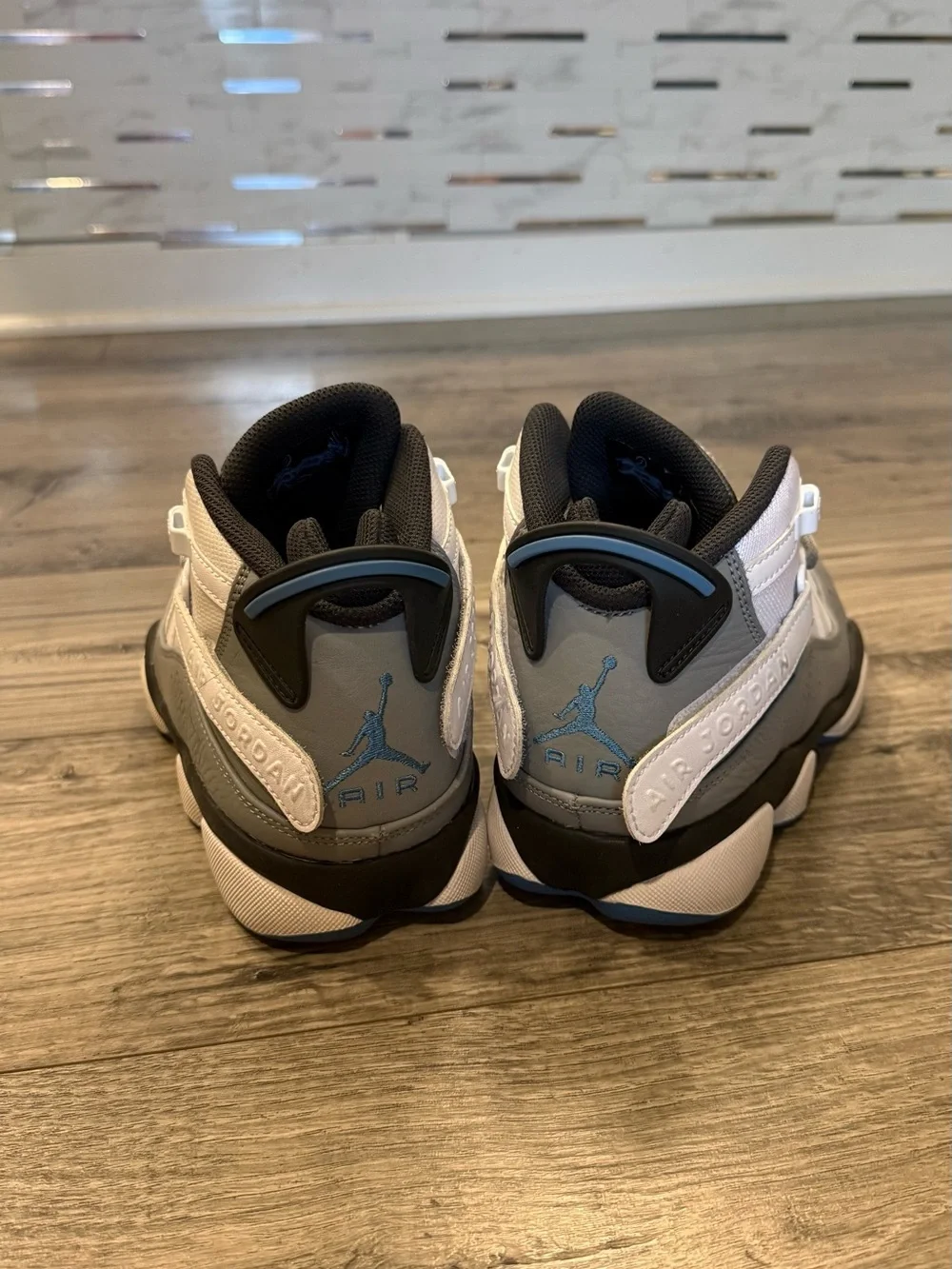 Jordan Men’s Mid-Top Sneakers in White and Gray
